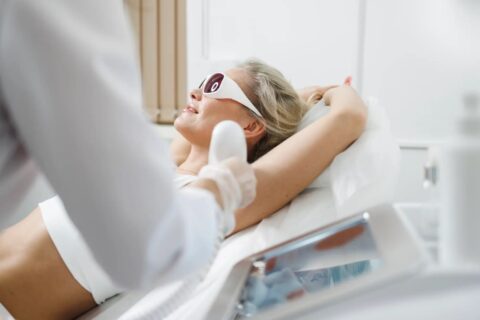 Women receiving laser hair treatment in Dallas, TX